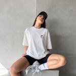 Girl wearing oversized Sweet Vibes Hello Kitty t-shirt by Navalook